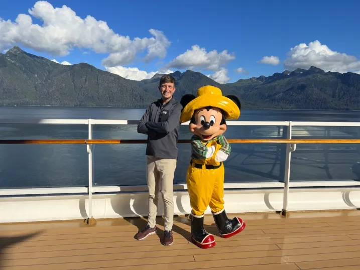 Gavin posed with Mickey Mouse.